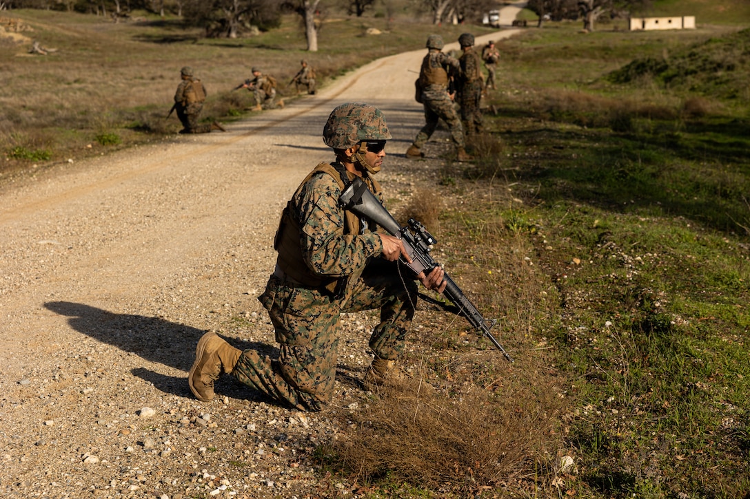 U.S. Marine Corps Cpl. Jordon Koi, a food service specialist, posts security during a Cold Weather Field Exercise at Fort Hunter-Liggett, Calif. on Jan. 10th, 2026. Koi is a part of Combat Logistics Battalion 23, 4th Marine Logistics Group. CLB-23 conducted a hike to transfer from one training area to another, designed to enhance and test readiness and lethality in the Marine Corps Reserve. Koi is a native of California. (U.S Marine Corps photo by Sgt. Eduardo Delatorre)