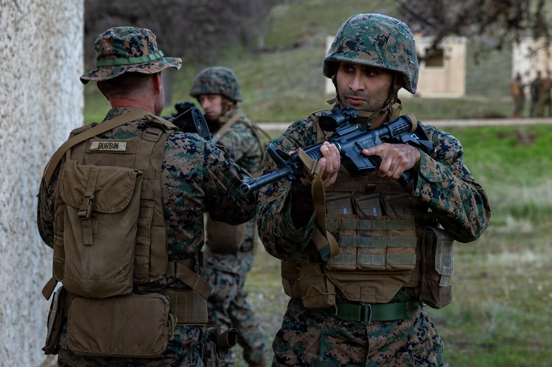 U.S. Marines demonstrate clearing a building during a Cold Weather Field Exercise at Fort Hunter-Liggett, Calif. on Jan. 10th, 2026. The Marines are a part of Combat Logistics Battalion 23, 4th Marine Logistics Group. CLB-23 conducted a hike to transfer from one training area to another, designed to enhance and test readiness and lethality in the Marine Corps Reserve. (U.S Marine Corps photo by Sgt. Eduardo Delatorre)
