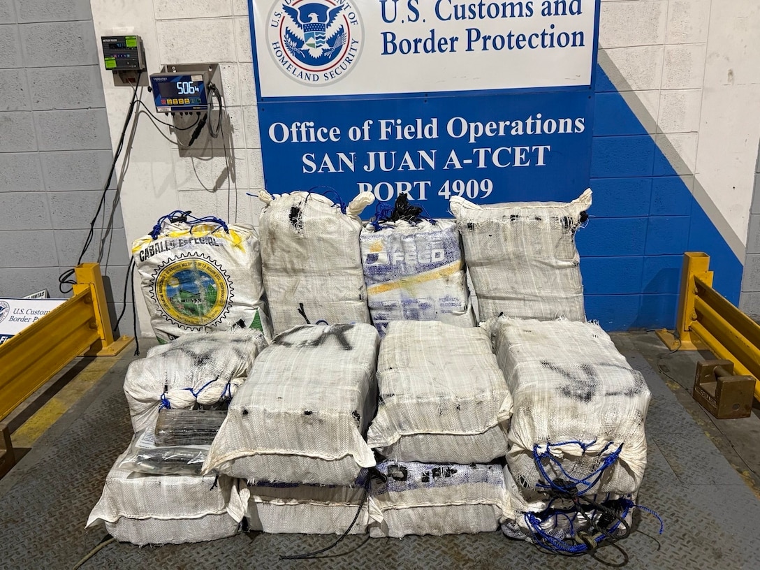 A Coast Guard Station San Juan boat crew and Homeland Security Task Force - San Juan Region partner agencies completed the custody transfer of three apprehended smugglers and the offload of sixteen bales of cocaine which weighed 506kgs/1,115.54 pounds which were valued at more than $7 million.  The apprehension and seizure followed the interdiction of a drug smuggling vessel in Atlantic Ocean waters north of Puerto Rico, Jan. 14, 2026. (U.S. Coast Guard photo)