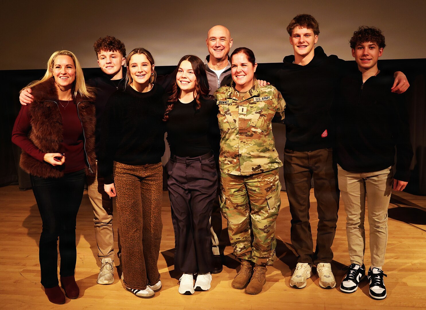Illinois Army National Guard Chief Warrant Officer 4 Melissa Downey is shown with her family after her promotion.