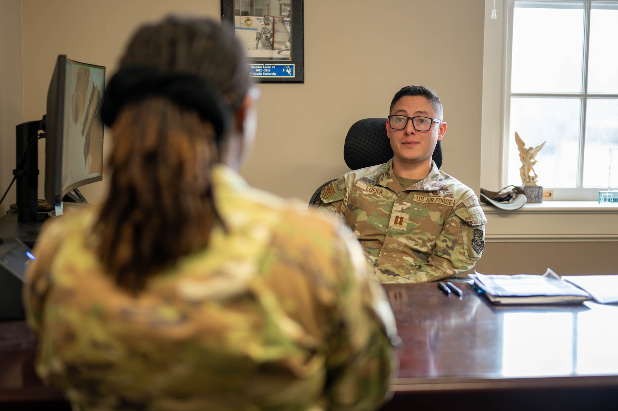 Airman listens to another Airman's concerns