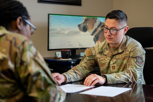 Airman explains a document