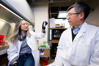 Tiffany Hennessa (left), Ph.D., U.S. Naval Research Laboratory (NRL) research biologist, and Zheng Wang, Ph.D., NRL research biologist, analyze a microbial sample in Washington, D.C., Jan. 9, 2026. Scientists at NRL sent microbial samples aboard the International Space Station to investigate how microgravity affects microbial metabolism and biomaterial production. (U.S. Navy photo by Sarah Peterson)