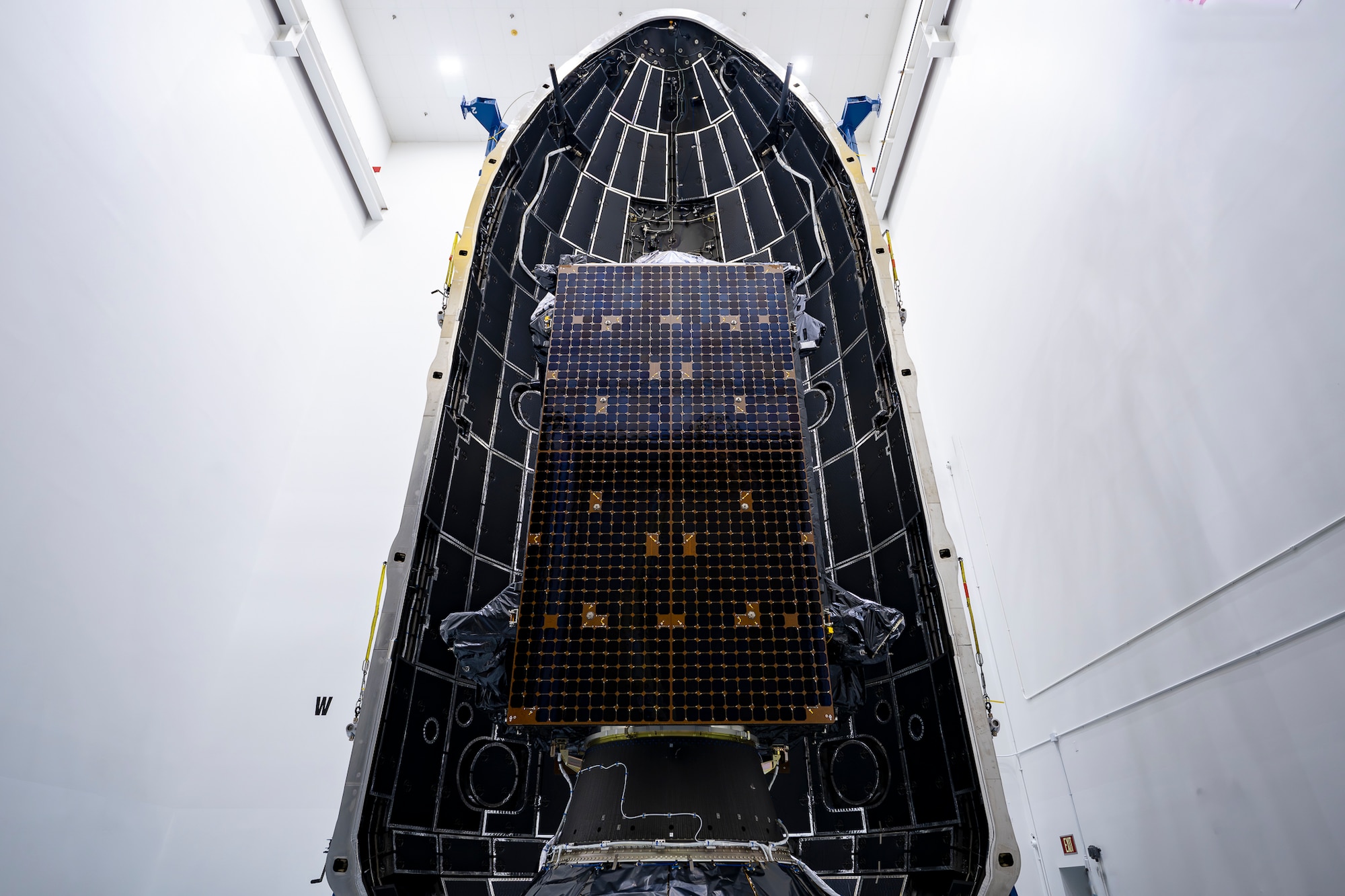 SpaceX teams encapsulated the U.S. Space Force's GPS III Space Vehicle 9 satellite into Falcon 9’s rocket fairing. This next GPS mission launch is planned for 25 January 2026. (Courtesy Photo)