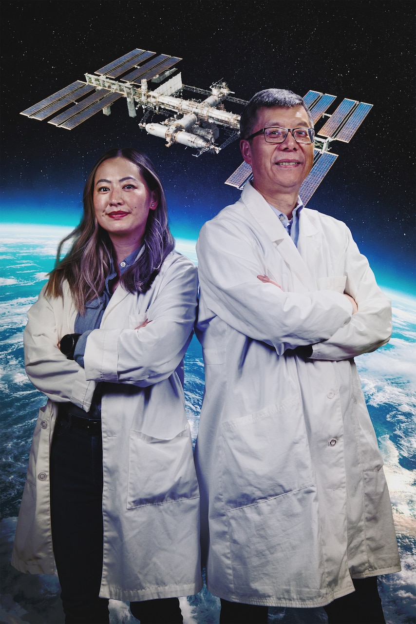 Tiffany Hennessa (left), Ph.D., U.S. Naval Research Laboratory (NRL) research biologist, and Zheng Wang, Ph.D., NRL research biologist, pose for a photo to recognize the completion of their Melanized Microbes for Multiple Uses in Space experiment in Washington, D.C., Jan. 9, 2026. The experiment allowed NRL scientists to send samples aboard the International Space Station to investigate how microgravity affects microbial metabolism and biomaterial production. (U.S. Navy photo/illustration by Sarah)