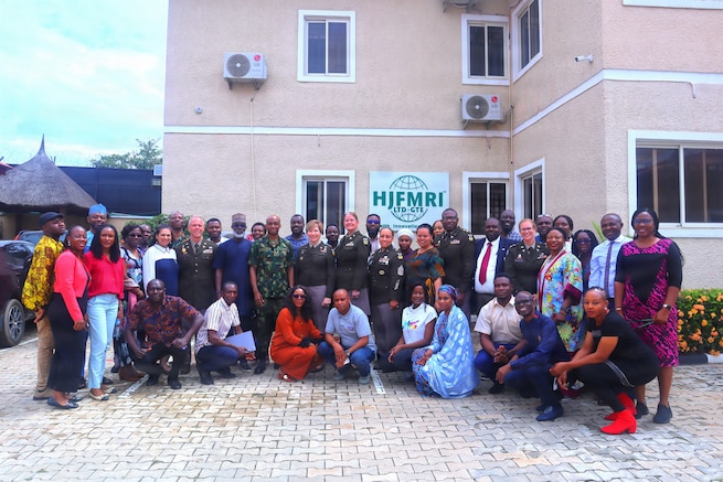 For 20 years, the Walter Reed Army Institute of Research-Africa (WRAIR-Africa) has partnered with the Nigerian Ministry of Defence Health Implementation Programme (NMODHIP) to provide HIV prevention, care, and treatment services to troops, their families, and wider communities in Nigeria. Following the celebration, MRDC and WRAIR leadership visited the U.S. Embassy in Abuja  and several of WRAIR-Africa’s collaborators and laboratories in Nigeria. The work being done in partnership between WRAIR and its regional stakeholders is an essential part of our combined successes in the fight against HIV/AIDS and other infectious diseases, ensuring the health and safety of service members and Nigerians. This photo was taken at the Clinical Research Centre Abuja by Paul Ashibel.