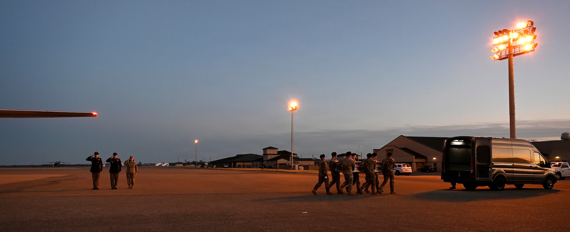 A U.S. Army team transfers the remains of United States Army Pvt. Christian Bacchus of Washington, D.C., Jan. 21, 2026, at Dover Air Force Base, Delaware.  Bacchus was assigned Company D, 1st Battalion 4th Infantry Regiment, Joint Multination Readiness Center, Hohenfels, Germany. (U.S. Air Force photo by Tech. Sgt. Rusty Frank)
