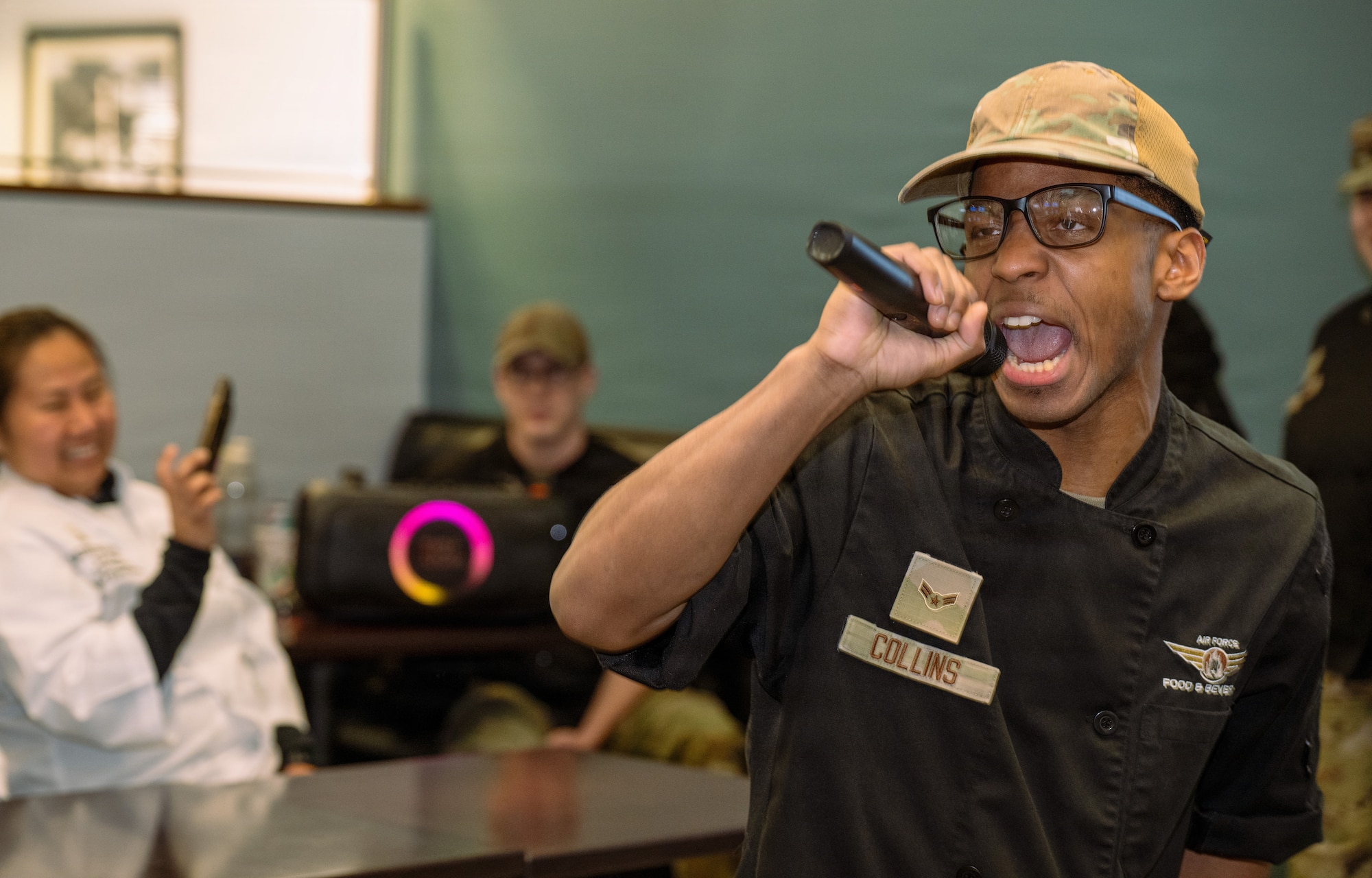 U.S. Air Force Airman 1st Class Zebulun Collins, 436th Force Support Squadron guest services, raps for critics of the Hennessy Food Services awards on Dover Air Force Base, Delaware, Jan. 22, 2026.