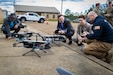 Vendors at the Innovation Industrial Conference observe drone displays outside of the Warrior Training Complex, Fort Polk, La. (U.S. Army photo by Porsha Auzenne)