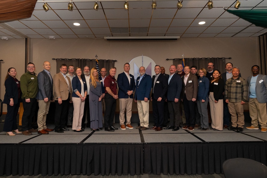A group photo of Minot AFB leadership and civilian Honorary Commanders