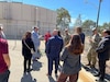 Fort Hunter Liggett Efficiency Manager Jarrod Ross briefs dignitaries at one of the installation’s wells, during a tour of water and energy facilities, September 2024.