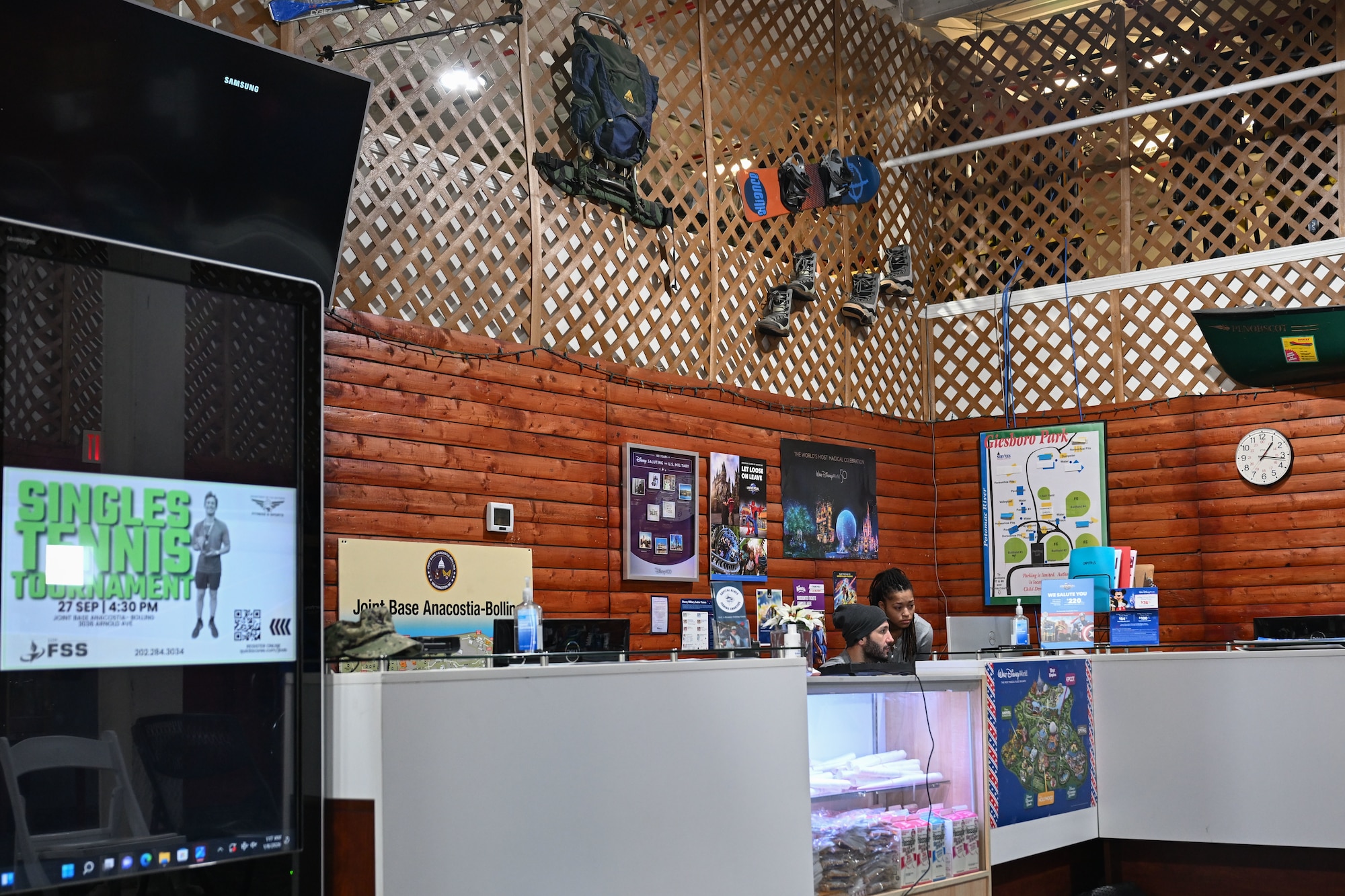 outdoor recreation staff helps with winter rentals