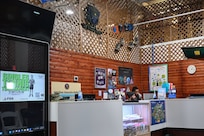 outdoor recreation staff helps with winter rentals