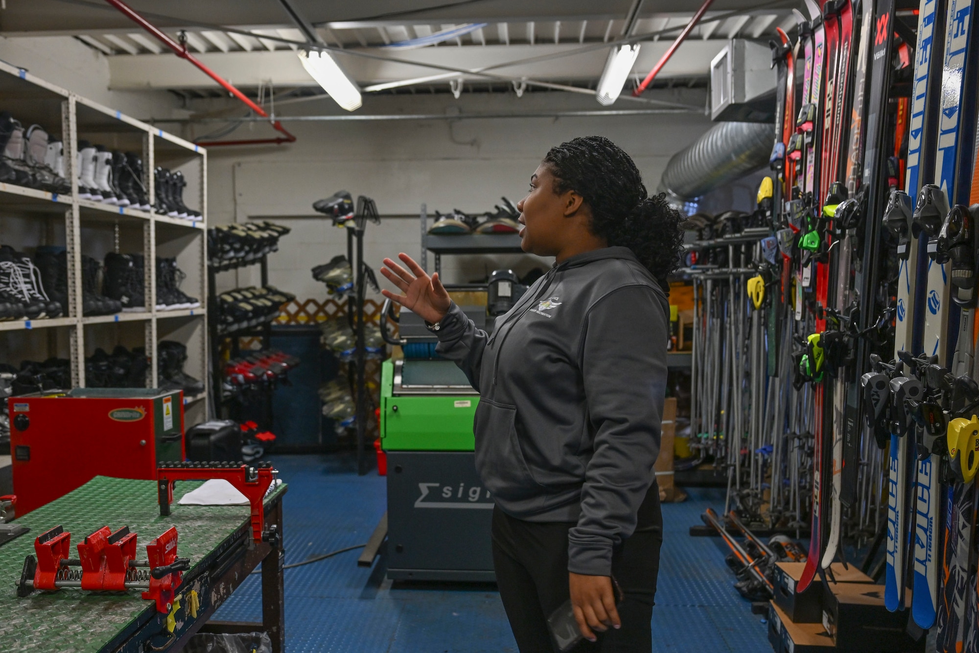 outdoor recreation staff helps with winter rentals