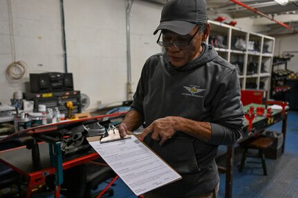 outdoor recreation staff helps with winter rentals