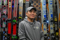 outdoor recreation staff helps with winter rentals