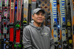 outdoor recreation staff helps with winter rentals