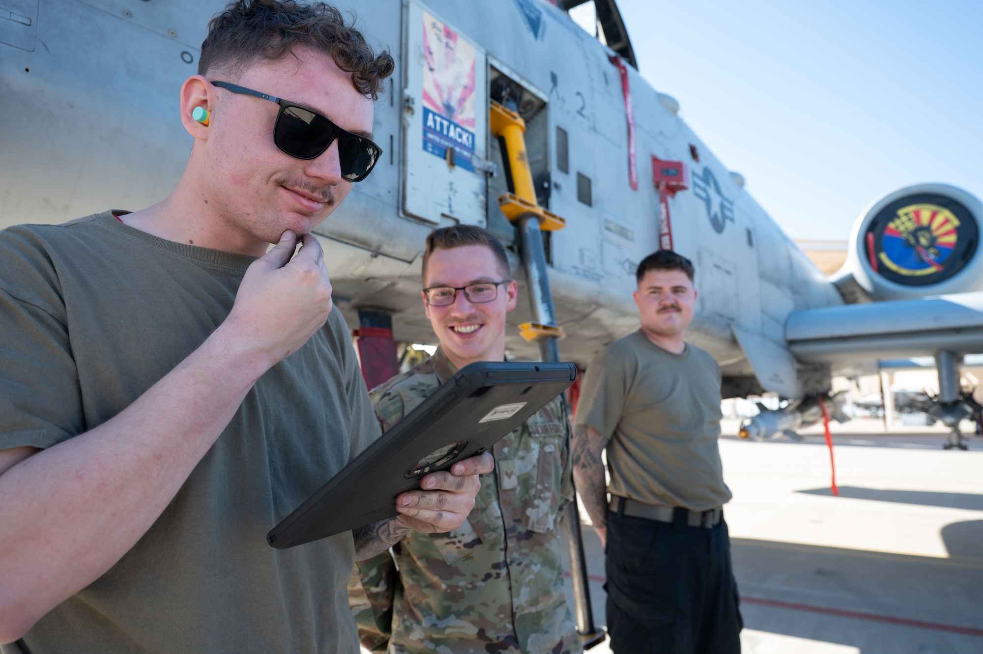 U.S. Air Force Staff Sgt. Collin Harvill, 357th Fighter Generation Squadron weapons load crew member, reviews his crew’s performance during the 2025 Load Competition of the Year at Davis-Monthan Air Force Base, Arizona, Jan. 16, 2026. The event provided crews an opportunity to assess performance and reinforce safe and efficient munitions loading procedures, proving their mission readiness capabilities. (U.S. Air Force photo by Airman 1st Class Jaden Kidd)