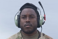 A close up of a service members face