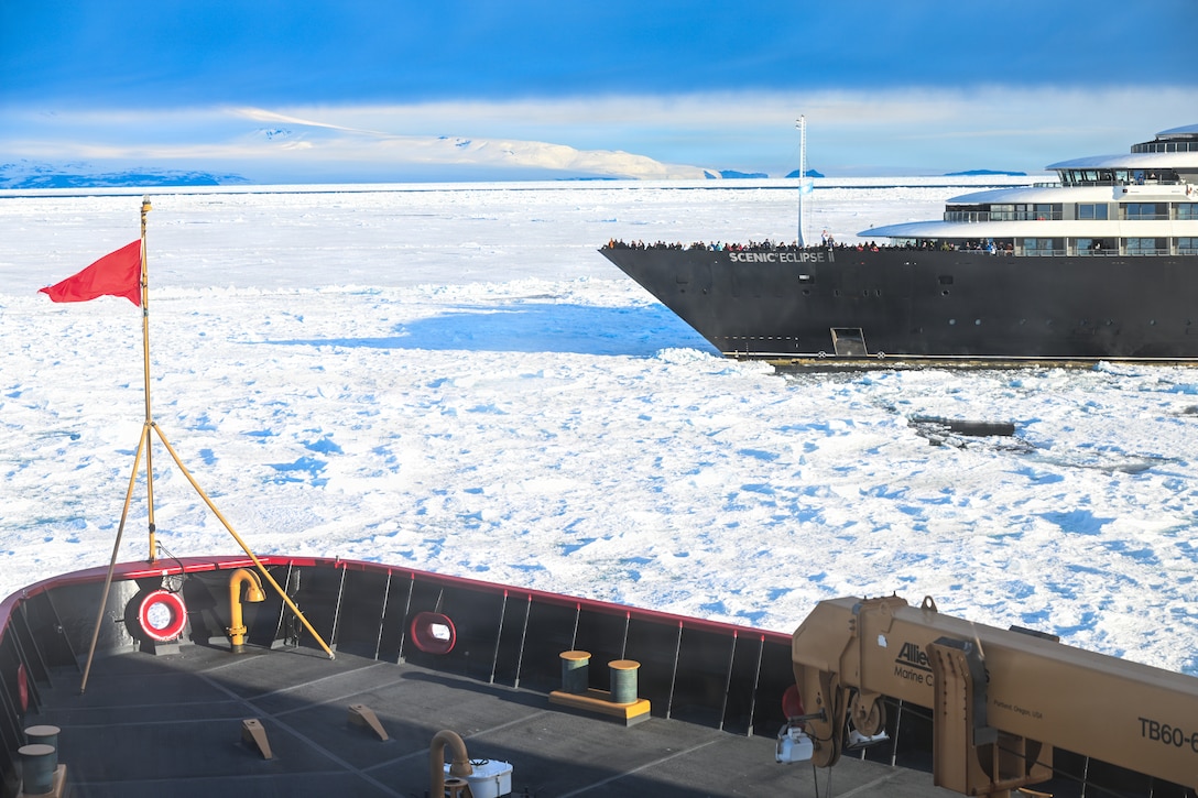 USCGC Polar Star (WAGB 10) transits alongside an Australian-owned cruise ship , Jan. 17, 2026 while supporting the U.S. Antarctic Program in Antarctica. The U.S. Antarctic Program, which carries forward the nation’s goals of supporting the Antarctic Treaty, fosters cooperative research with other nations, protects the Antarctic environment, and develops measures to ensure only equitable and wise use of resources. (U.S. Coast Guard photo by Petty Officer 2nd Class Christopher Bokum)