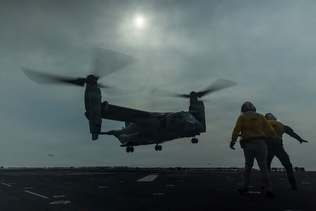 A U.S. Marine Corps MV-22B Osprey with Marine Medium Tiltrotor Squadron (VMM) 163 (Reinforced), 11th Marine Expeditionary Unit, prepares to land on the flight deck of Wasp-class amphibious assault ship USS Boxer (LHD 4), in the Pacific Ocean, Jan. 21, 2026.