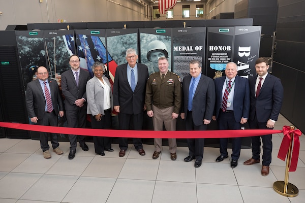 Leaders stand in front of Barfoot