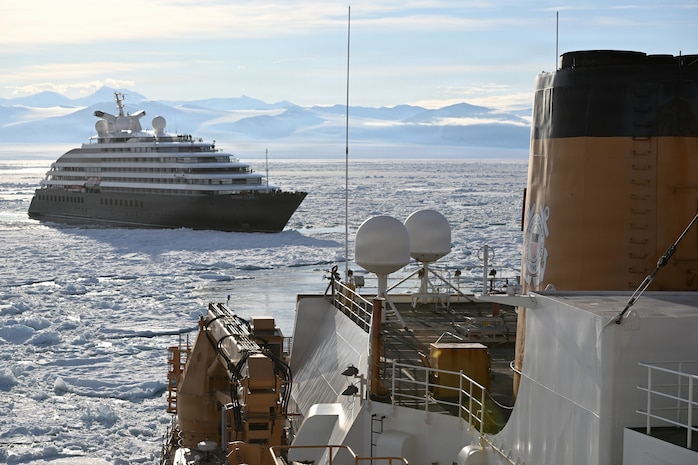 USCGC Polar Star (WAGB 10) escorts an Australian -owned cruise ship out of pack ice in the Ross Sea after the vessel requested assistance amid Operation Deep Freeze 2026, Jan. 17, 2026. Pacific Air Forces operates on a 24-hour basis to provide the U.S. National Science Foundation complete joint operational and logistic support for Operation Deep Freeze. (U.S. Coast Guard photo by Petty Officer 2nd Class Christopher Bokum)