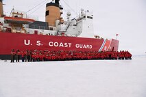 USCGC Polar Star (WAGB 10) crew members pose for a group photo while the cutter sits hove-to in the Ross Sea during Operation Deep Freeze 2026, Jan. 12, 2026. The cutter turns 50 years old on Jan. 17, 2026 amid Operation Deep Freeze, which is a joint service, inter-agency support operation for the National Science Foundation that manages the United States Antarctic Program. (U.S. Coast Guard photo by Petty Officer 2nd Class Christopher Bokum)