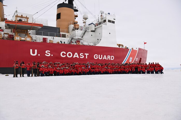 USCGC Polar Star (WAGB 10) crew members pose for a group photo while the cutter sits hove-to in the Ross Sea during Operation Deep Freeze 2026, Jan. 12, 2026. The cutter turns 50 years old on Jan. 17, 2026 amid Operation Deep Freeze, which is a joint service, inter-agency support operation for the National Science Foundation that manages the United States Antarctic Program. (U.S. Coast Guard photo by Petty Officer 2nd Class Christopher Bokum)
