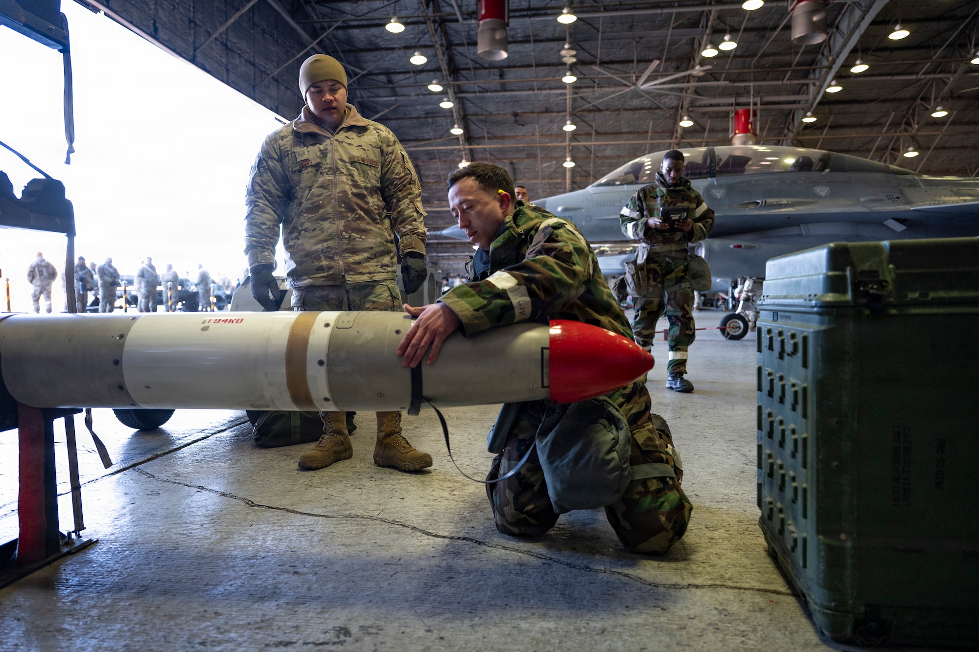 U.S. Air Force Airmen assigned to the 36th Fighter Generation Squadron prepare munitions during the Annual Bomb Build and Loading Competition at Osan Air Base, Republic of Korea, Jan. 22, 2026.