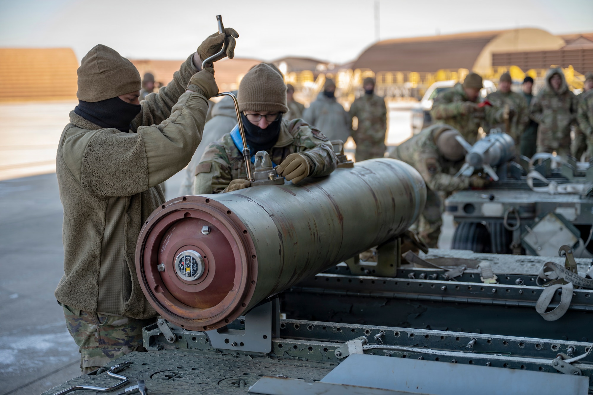U.S. Air Force Airmen assigned to the 51st Munitions Squadron prepare munitions during the Annual Bomb Build and Loading Competition at Osan Air Base, Republic of Korea, Jan. 22, 2026.