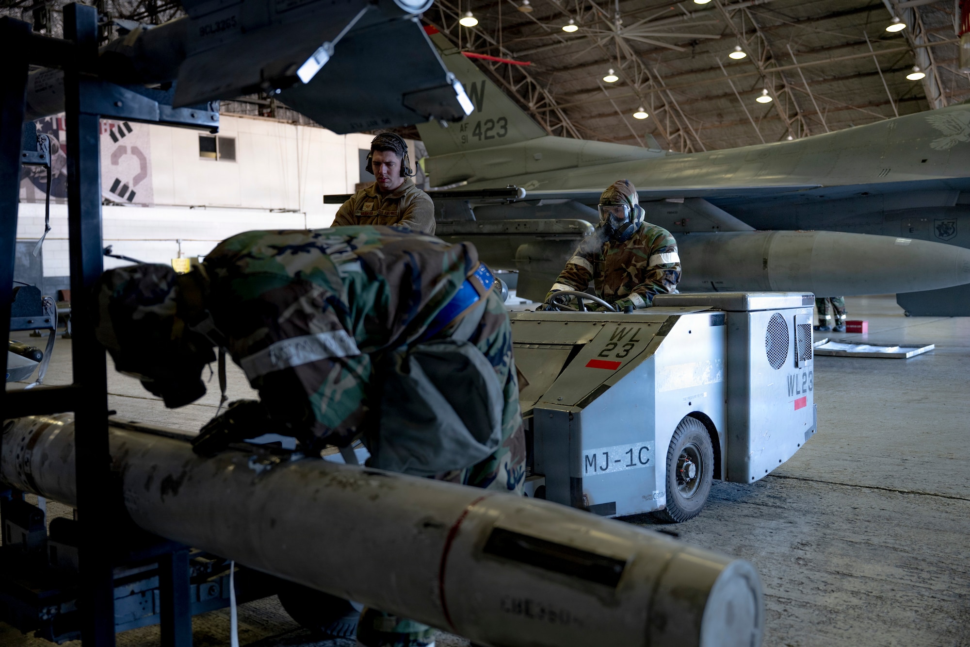 U.S. Air Force Airmen assigned to the 35th Fighter Generation prepare munitions during the Annual Bomb Build and Loading Competition at Osan Air Base, Republic of Korea, Jan. 22, 2026.