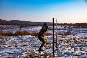 U.S. Soldiers assigned to 1st Battalion, 4th Infantry Regiment, Joint Multinational Readiness Center, operate a small unmanned aircraft system during the Drone Validation Course at the JMRC in Hohenfels, Germany, Jan. 21, 2026. The course trains opposing forces Soldiers to employ reconnaissance and first-person view drone capabilities to replicate modern battlefield threats during rotational training. (U.S. Army photo by Spc. Adrian Greenwood)