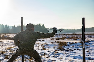 U.S. Soldiers assigned to 1st Battalion, 4th Infantry Regiment, Joint Multinational Readiness Center, operate a small unmanned aircraft system during the Drone Validation Course at the JMRC in Hohenfels, Germany, Jan. 21, 2026. The course trains opposing forces Soldiers to employ reconnaissance and first-person view drone capabilities to replicate modern battlefield threats during rotational training. (U.S. Army photo by Spc. Adrian Greenwood)