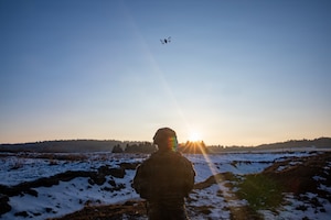 U.S. Soldiers assigned to 1st Battalion, 4th Infantry Regiment, Joint Multinational Readiness Center, operate a small unmanned aircraft system during the Drone Validation Course at the JMRC in Hohenfels, Germany, Jan. 21, 2026. The course trains opposing forces Soldiers to employ reconnaissance and first-person view drone capabilities to replicate modern battlefield threats during rotational training. (U.S. Army photo by Spc. Adrian Greenwood)