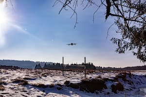 U.S. Soldiers assigned to 1st Battalion, 4th Infantry Regiment, Joint Multinational Readiness Center, operate a small unmanned aircraft system during the Drone Validation Course at the JMRC in Hohenfels, Germany, Jan. 21, 2026. The course trains opposing forces Soldiers to employ reconnaissance and first-person view drone capabilities to replicate modern battlefield threats during rotational training. (U.S. Army photo by Spc. Adrian Greenwood)