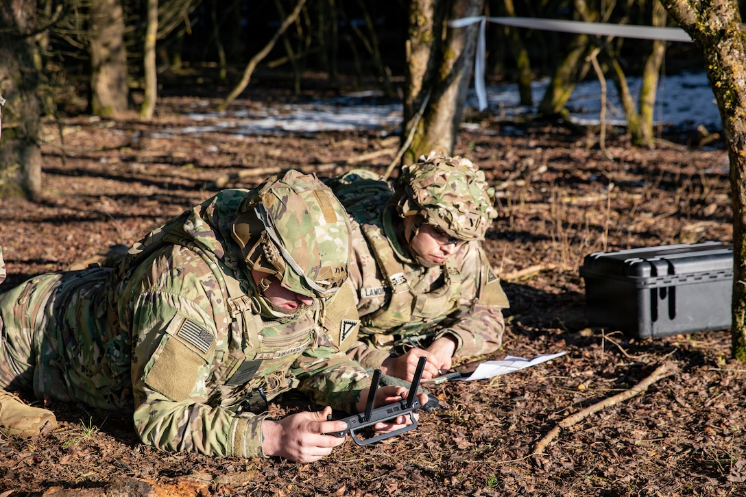 U.S. Soldiers assigned to 1st Battalion, 4th Infantry Regiment, Joint Multinational Readiness Center, operate a small unmanned aircraft system during the Drone Validation Course at the JMRC in Hohenfels, Germany, Jan. 21, 2026. The course trains opposing forces Soldiers to employ reconnaissance and first-person view drone capabilities to replicate modern battlefield threats during rotational training. (U.S. Army photo by Spc. Adrian Greenwood)