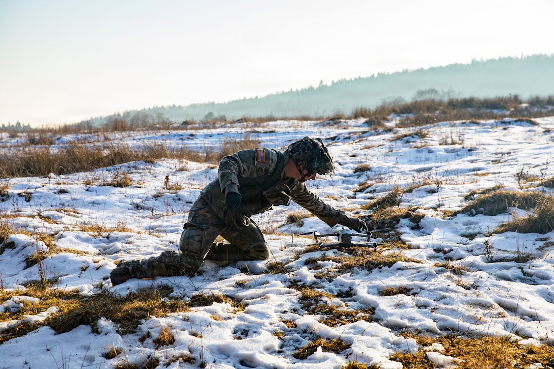 U.S. Soldiers assigned to 1st Battalion, 4th Infantry Regiment, Joint Multinational Readiness Center, operate a small unmanned aircraft system during the Drone Validation Course at the JMRC in Hohenfels, Germany, Jan. 21, 2026. The course trains opposing forces Soldiers to employ reconnaissance and first-person view drone capabilities to replicate modern battlefield threats during rotational training. (U.S. Army photo by Spc. Adrian Greenwood)