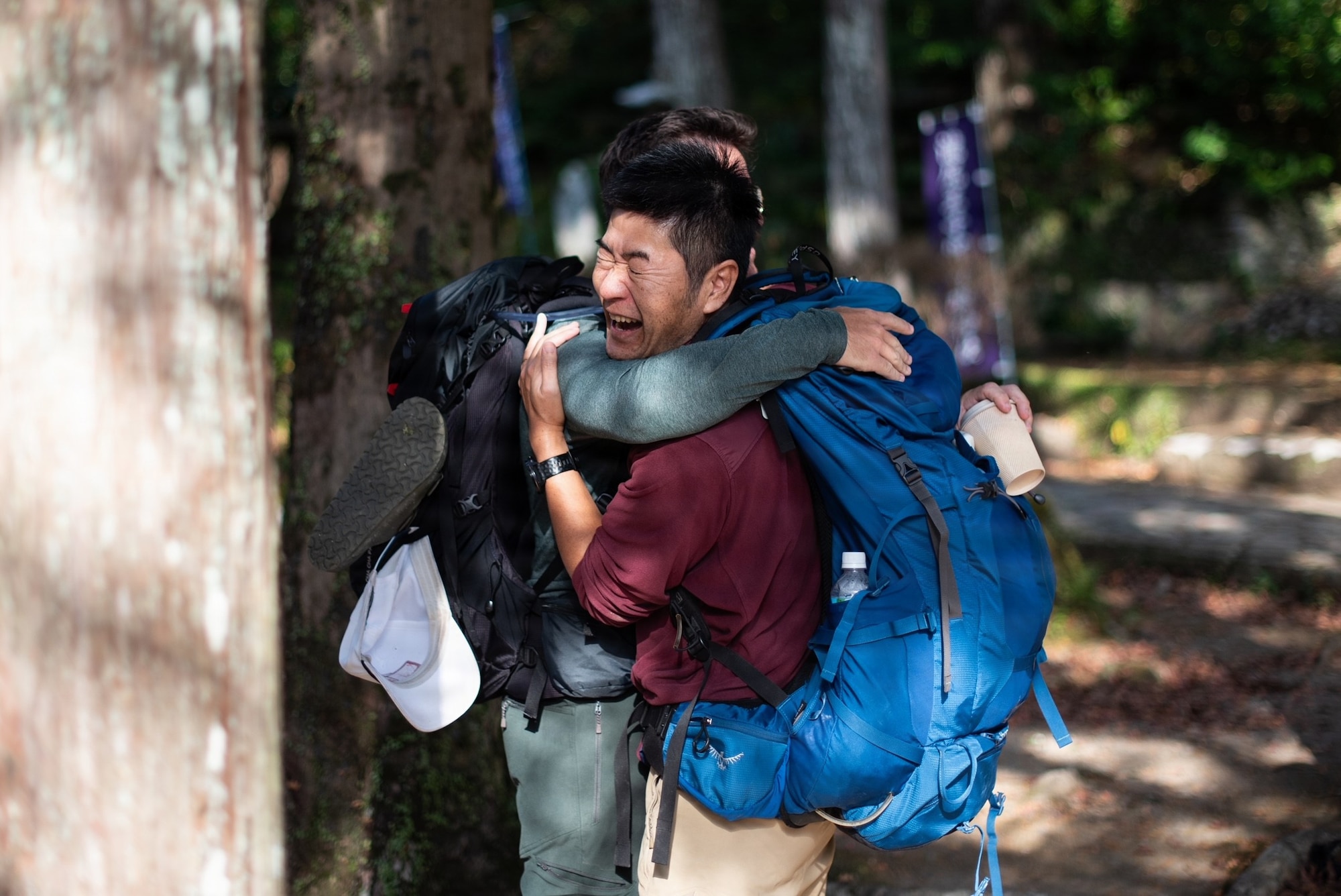 Team Kadena participants embrace after completing the final leg of the Kumano Kodo trail in Wakayama Prefecture, Japan, Dec. 4–9, 2025.