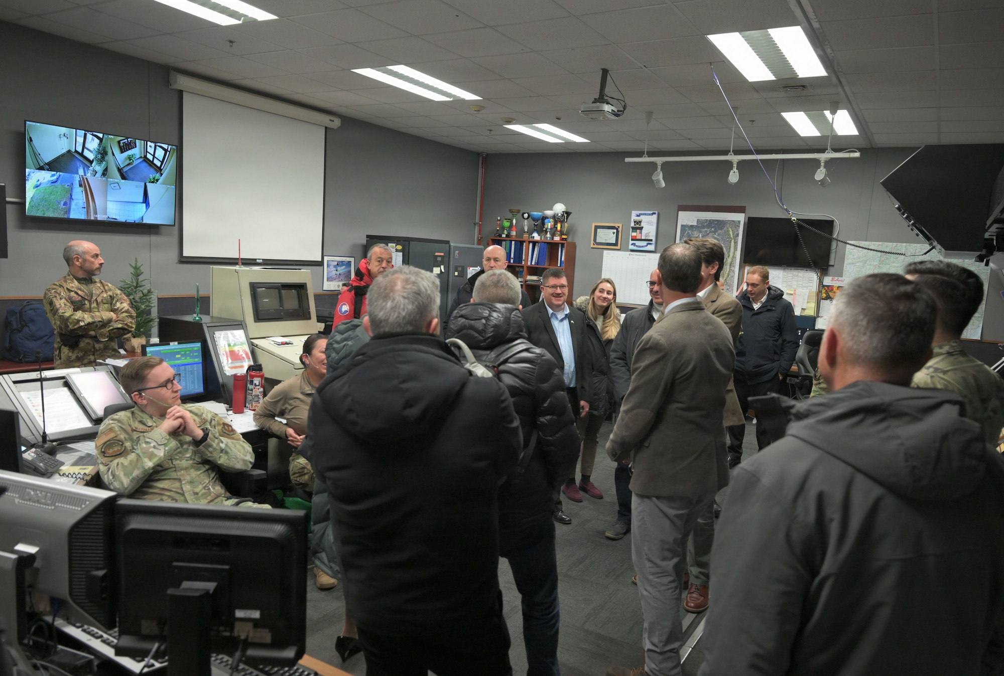 High ranking officials participate in a tour of the Radar Approach facility.