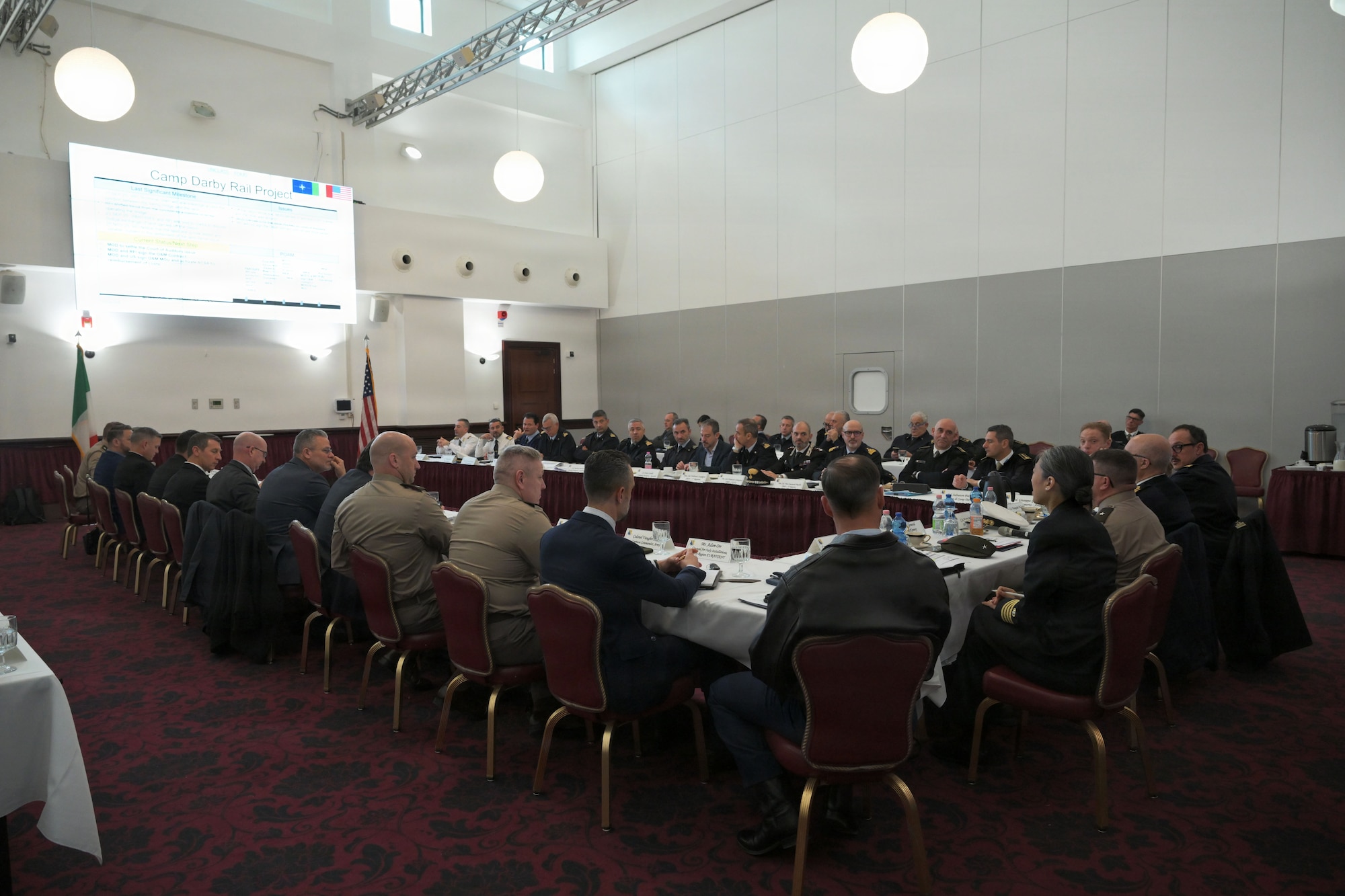 High ranking officials participate in a briefing.