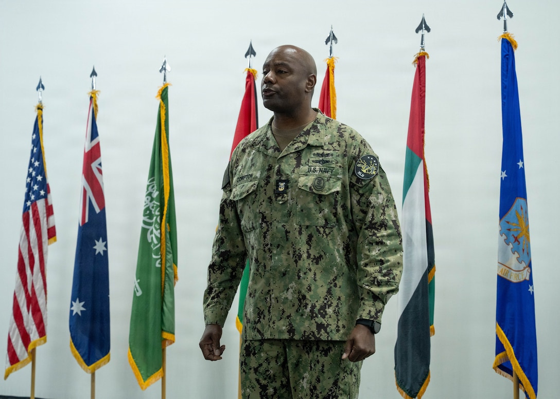 U.S. Navy Fleet Master Chief Lateef N. Compton, U.S. Central Command senior enlisted leader, speaks to coalition senior leaders at the U.S. Air Forces Central Command Multilateral Professional Development Seminar, in the U.S. Central Command area of responsibility, Jan. 7, 2026. The seminar highlighted the critical role the enlisted corps plays in bridging cultural and organizational differences, enabling seamless integration across forces. (U.S Air Force photo by Senior Airman William Pugh)