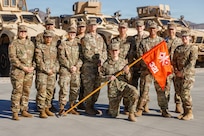 U.S. Army Soldiers attached to the 321st Signal Company pose for a photo at the Speedway Armory in Las Vegas, Nevada, Dec. 6, 2025.