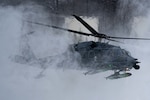 An Alaska Air National Guard HH-60G Pave Hawk helicopter assigned to the 210th Rescue Squadron, 176th Wing, takes off at Joint Base Elmendorf-Richardson, Alaska, Oct. 26, 2022. The 210th, along with the 211th and 212th Rescue Squadrons, make up the 176th Wing Rescue Triad and are among the busiest search and rescue units in the world. Photo by Airman 1st Class Julia Lebens.