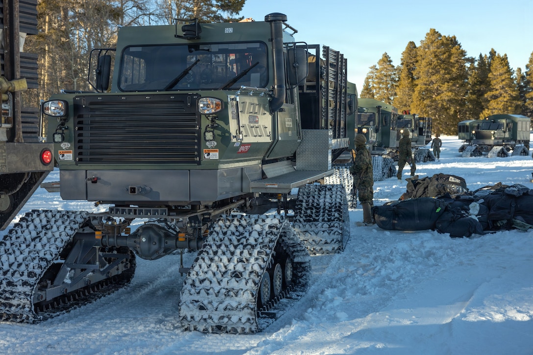 U.S. Marines with Combat Logistics Battalion 24, Combat Logistics Regiment 27, 2nd Marine Logistics Group, stage Tucker Terra Model 1600 Sno-Cat assigned to Marine Corps Mountain Warfare Training Center while establishing field lodging as part of Mountain Training Exercise 1-26 at MCMWTC in Bridgeport, California, Jan. 16, 2026. The field lodging will consist of a chapel, a forward battalion aid station, and a field Marine Corps Exchange to ensure the Marines and Sailors’ safety and quality of life throughout their time in the field. Exercises like MTX 1-26 prove Marines’ ability to provide flexible and responsive combat service support during high intensity combat operations in contested and mountainous terrain. (U.S. Marine Corps photo by Lance Cpl. Isabelle Veillette)