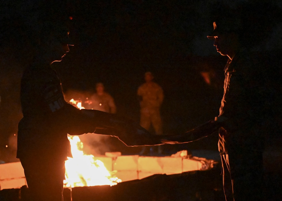Airmen burning flags