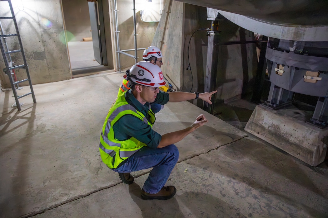 Kevin Vogel, Fort Peck Dam project engineer, U.S. Army Corps of Engineers, Omaha District, reviews progress on the butterfly valve rehabilitation project, Dec. 10, 2025, at the Fort Peck Dam in Montana.
