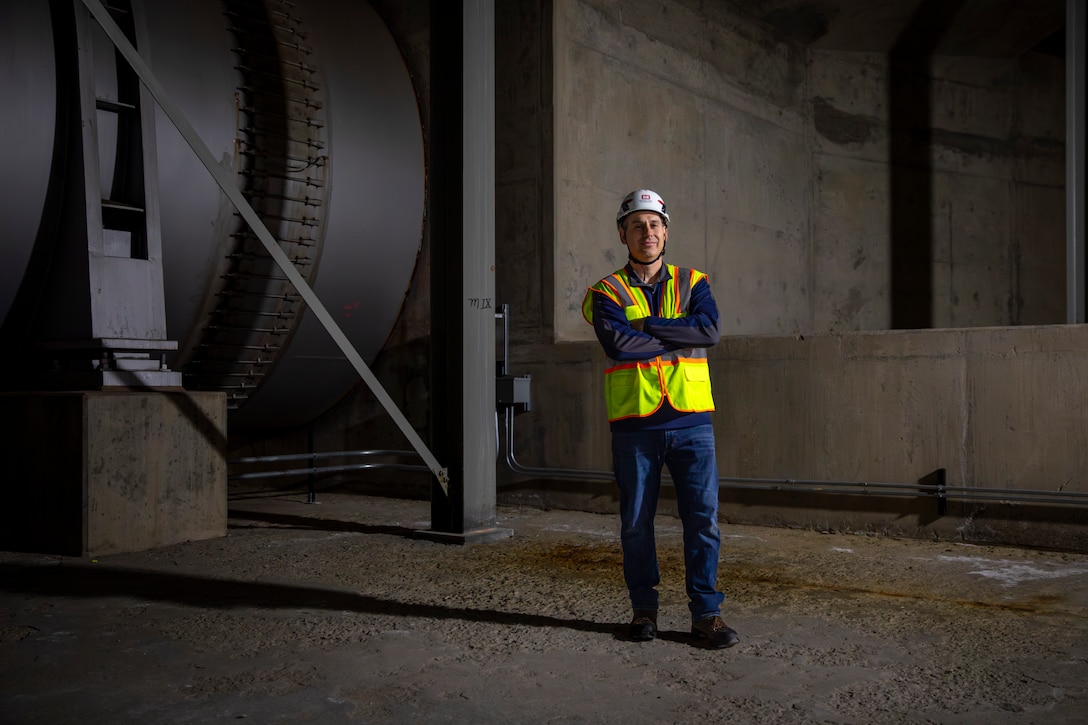 Ron Beyer, project manager, U.S. Army Corps of Engineers, Omaha District, reviews progress on the butterfly valve rehabilitation project, Dec. 10, 2025, at the Fort Peck Dam in Montana.