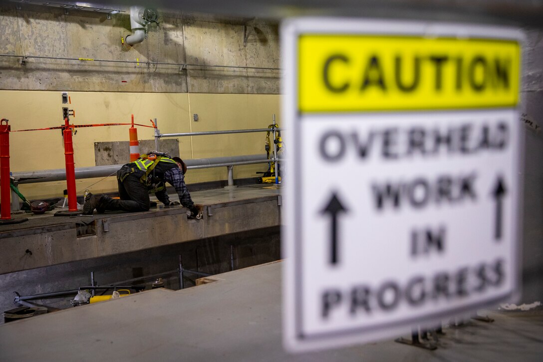 The U.S. Army Corps of Engineers, Omaha District, oversees progress on the butterfly valve rehabilitation project, Dec. 10, 2025, at the Fort Peck Dam in Montana.