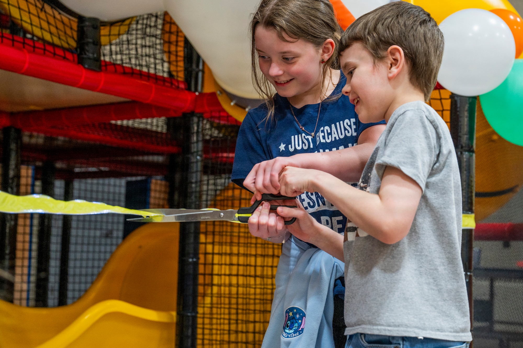 Children of Guardians assigned to the 10th Space Warning Squadron cut the ribbon to the play area in the community center at Cavalier Space Force Station, North Dakota, Jan. 9, 2026.